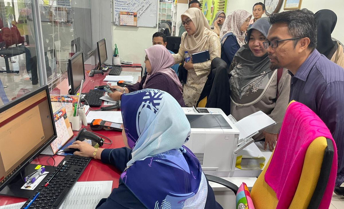 Lawatan Kerja Penanda Aras Transformasi Digital Kutipan Hasil Tanah di Pejabat PTG Negeri Sembilan